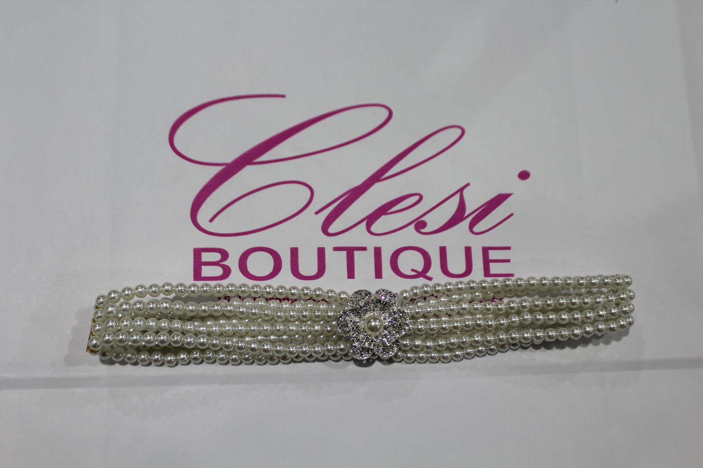 Cintura con fibbia a fiore